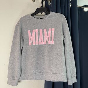 SHEIN sweatshirt. Large. Grey with Pink a lettering saying Miami.